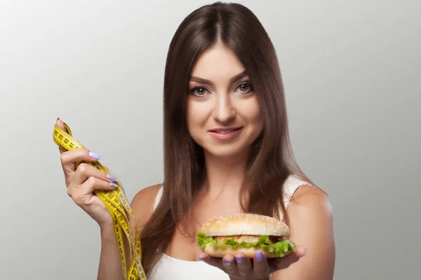 Harmful food. The choice between malicious food and sport. Beaut — Stock Photo, Image