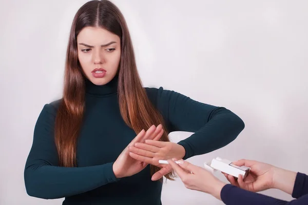 Closeup Of Woman Giving Up Smoking Cigarettes. Health Concept