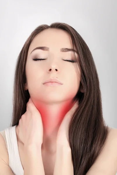 Throat Pain. Ill Woman With Sore Throat Feeling Bad, Suffering From Painful Swallowing, Strong Pain In Throat, Touching Neck With Hand. Beautiful Woman Caught Cold. Health Concept. High Resolution