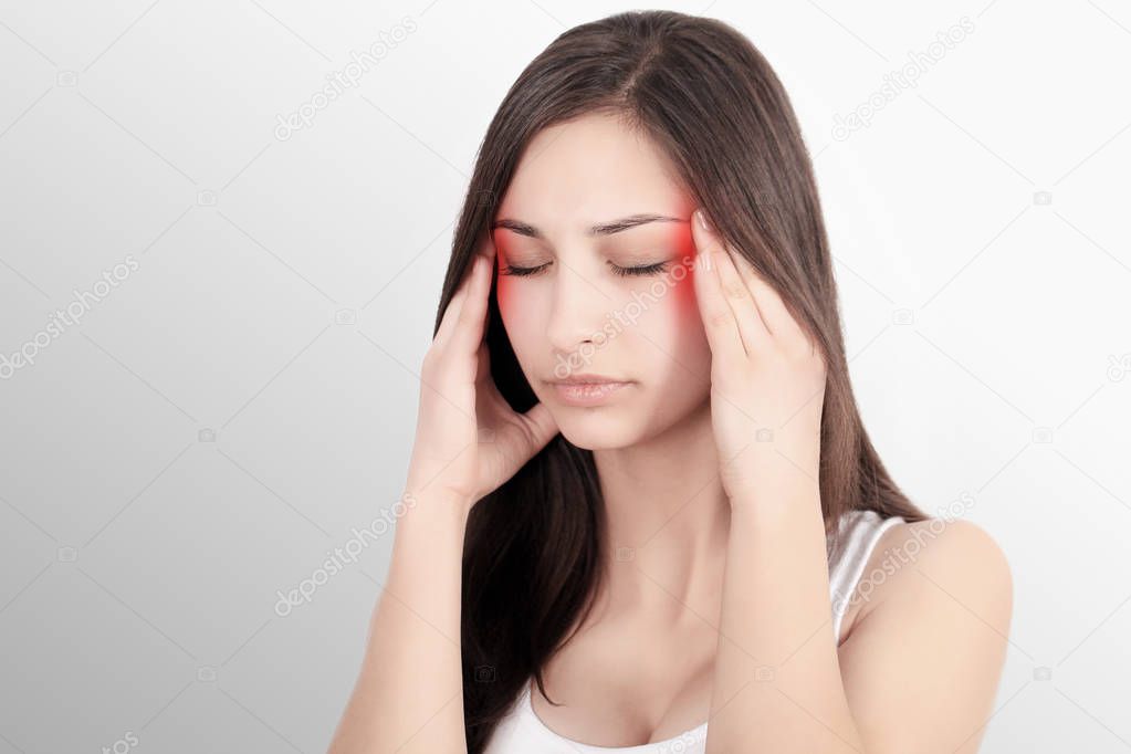 Headache, migraine and stress. The woman's worries frustrate a woman who suffers from headache. Young beautiful girl. Treatment. Migraine. Cold.