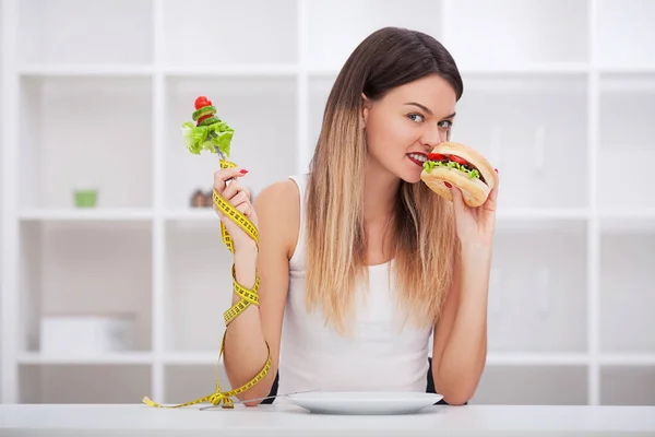 Diet. The concept of healthy and unhealthy nutrition. The model — Stock Photo, Image