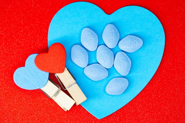 Pil voor mannen gezondheid en Valentijnsdag achtergrond. — Stockfoto