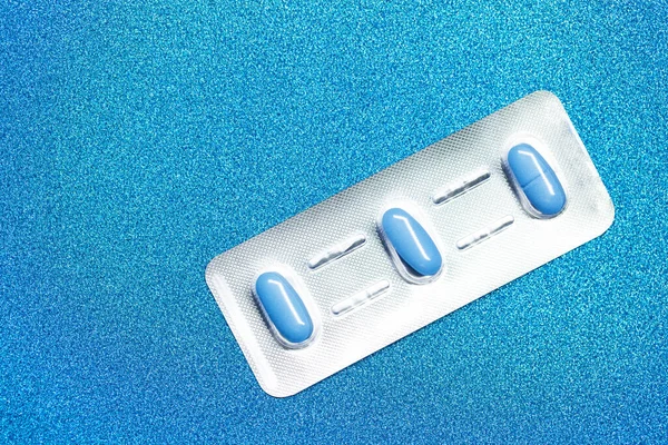 Pill for mens health and Valentines Day background.