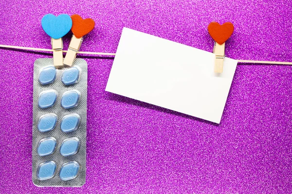 Pill for mens health and Valentine day background.