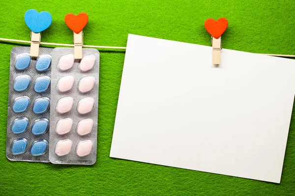 Pill for mens health and Valentines Day background.