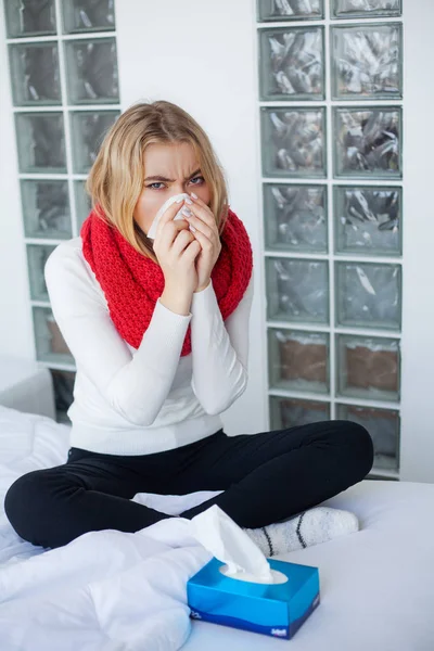 Sick woman suffers from a cold at home — 스톡 사진