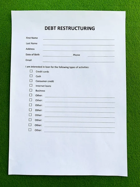 Document with title debt restructuring, top view. — 스톡 사진