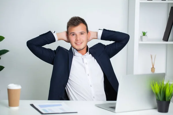 Solid businessman in a jacket works in office of the company — Stock Photo, Image