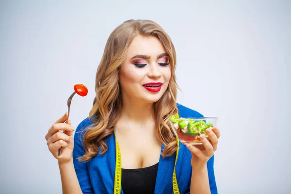 Portrait of a young beautiful girl who supports the diet. — Stock Photo, Image