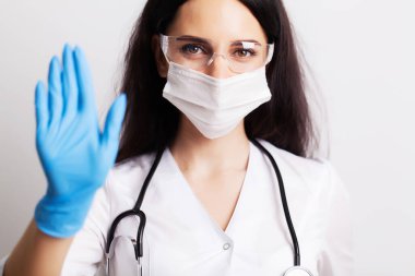 Tıp konsepti, kadın doktor, dur hareketi.