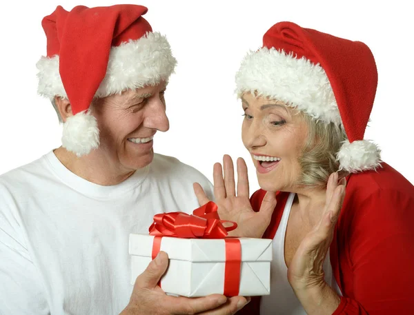 Senior couple with Christmas present — Stock Photo, Image