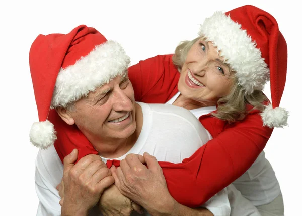 Couple aîné en chapeaux de Père Noël — Photo