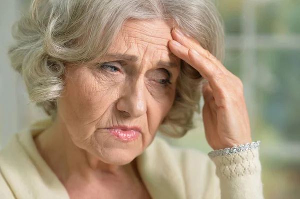 Upset senior woman — Stock Photo, Image