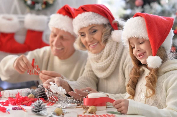 Family preparing for Christmas — Stock Photo, Image