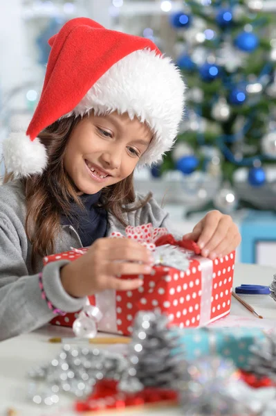 Child with Christmas present Royalty Free Stock Photos