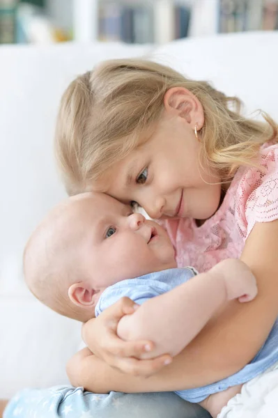 Sister with her baby brother — Stock Photo, Image