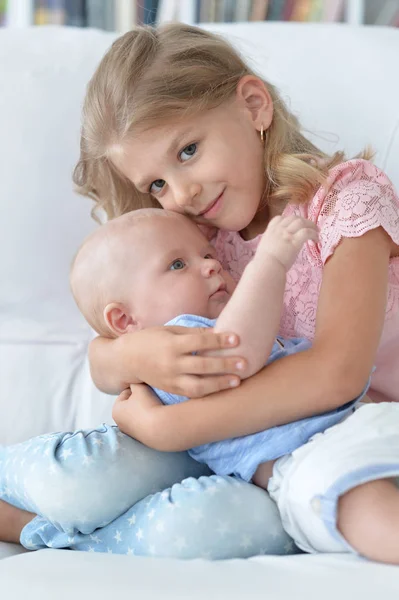Sister with her baby brother — Stock Photo, Image