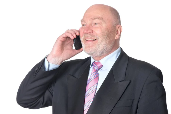 Dojrzały biznesmen rozmawia przez telefon — Zdjęcie stockowe