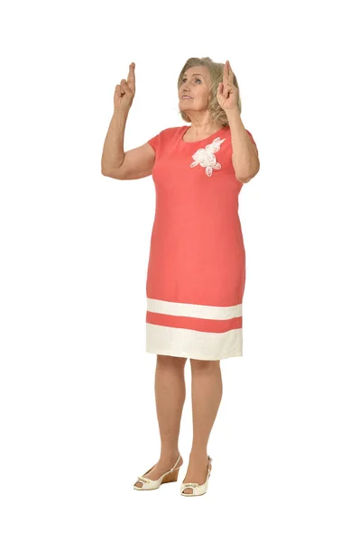 Senior Kvinna i korall klänning — Stockfoto