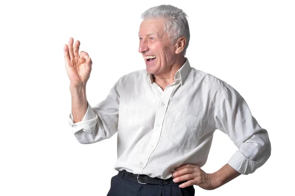 Senior zeigt Ok-Zeichen — Stockfoto