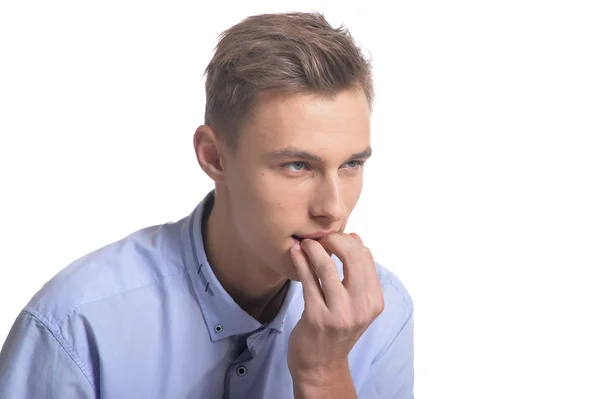 Jonge man te maken van gelaatsuitdrukking — Stockfoto