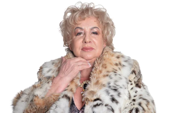 Senior woman in fur coat — Stock Photo, Image