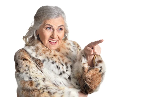 Senior woman in fur coat — Stock Photo, Image