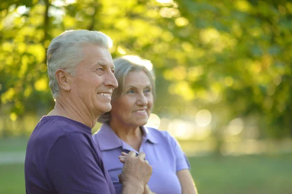 Senior couple resting outdoors — Stock Photo, Image