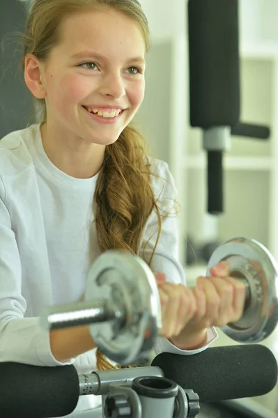 Little girl doing exercises — Stock Photo, Image