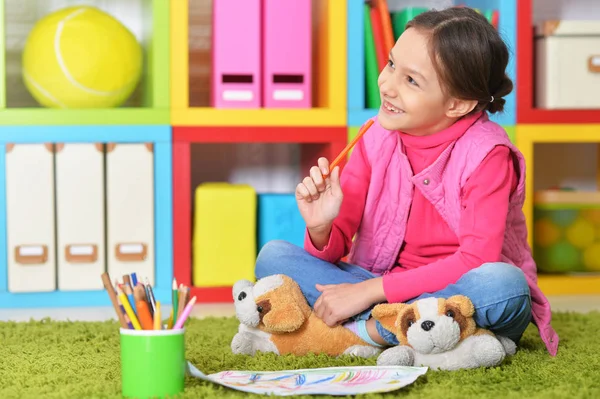 Cute  girl sitting on floor — Stock Photo, Image