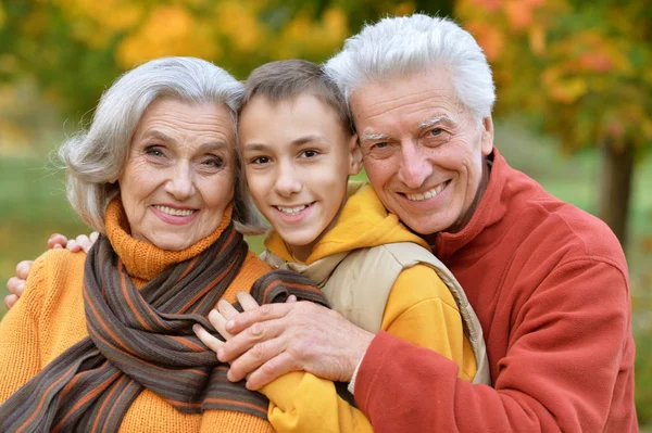 Grandparents and grandson outdoors — Stock Photo, Image