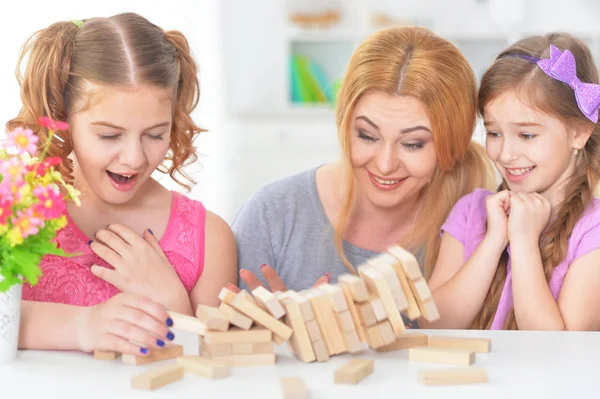 Family playing with  blocks together Royalty Free Stock Photos