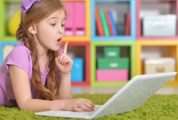 Girl using modern laptop — Stock Photo, Image