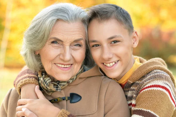 Happy grandmother  and grandson hugging — Stock Photo, Image