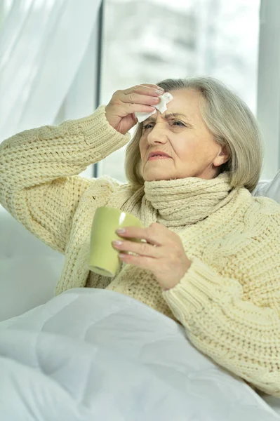 Ill senior woman — Stock Photo, Image