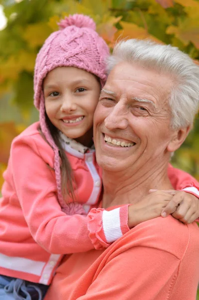 Happy grandfather and granddaughter — Stock Photo, Image