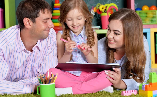 Little girl with plaits drawing — Stock Photo, Image