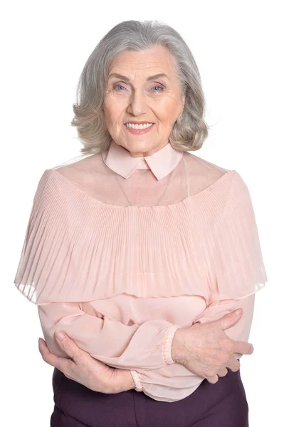 Seniorin in pinkfarbener Bluse — Stockfoto