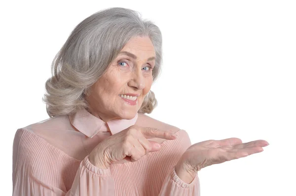 Senior woman in pink blouse — Stock Photo, Image