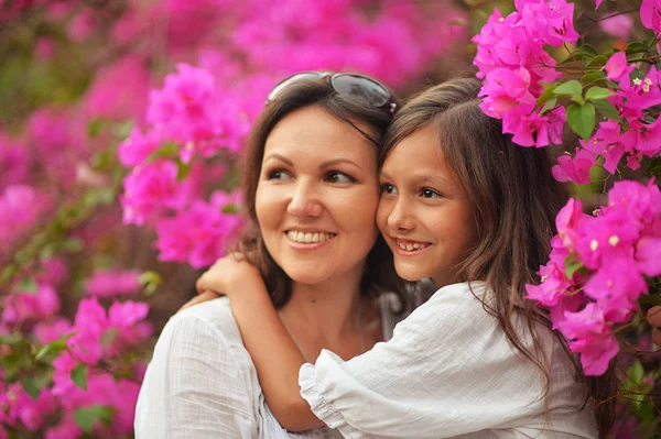 Happy mother and daughter hugging — Stock Photo, Image