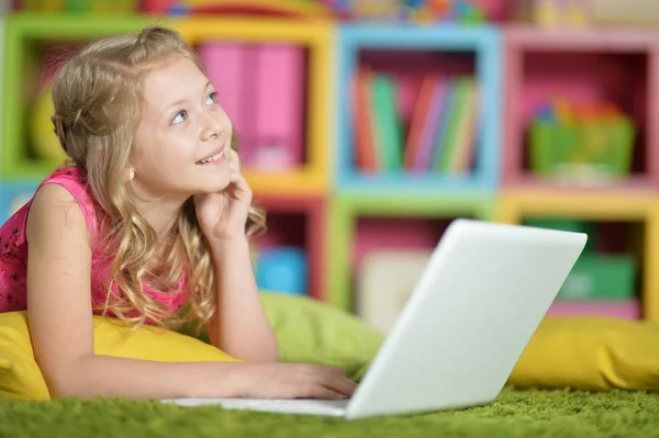 Cute little girl with  laptop — Stock Photo, Image