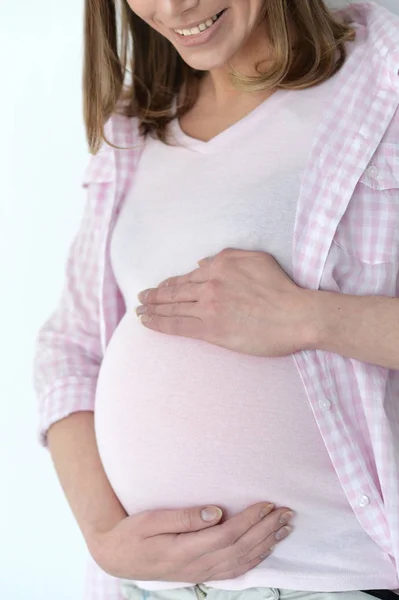 Красивая беременная девушка — стоковое фото