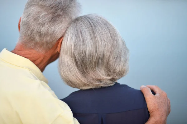 Senior couple hugging outdoor — Stock Photo, Image
