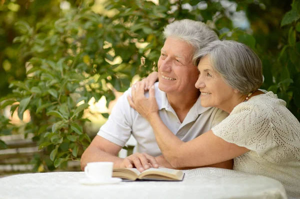 Senior couple  reading a book — Stock Photo, Image