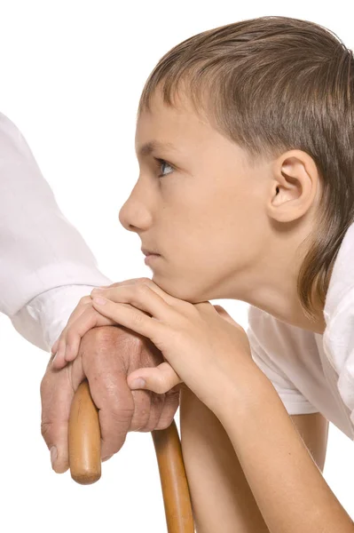 Nipote appoggiato sulla mano dei nonni — Foto Stock