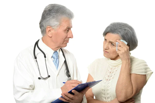 Elderly doctor with a patient — Stock Photo, Image