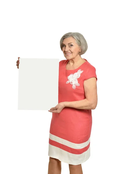 Starší žena s prázdnou kartu — Stock fotografie