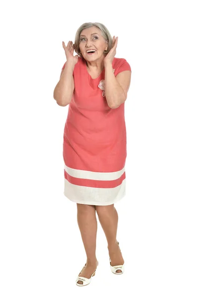 Seniorkvinne i rosa kjole – stockfoto
