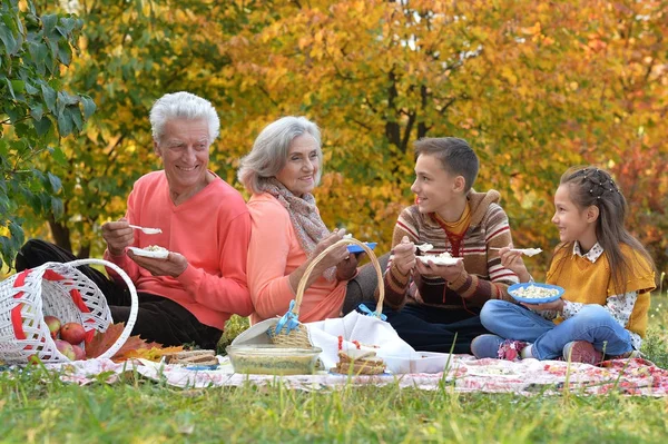 Family on picnic in autumn — Stock Photo, Image