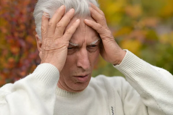 Senior man with headache — Stock Photo, Image